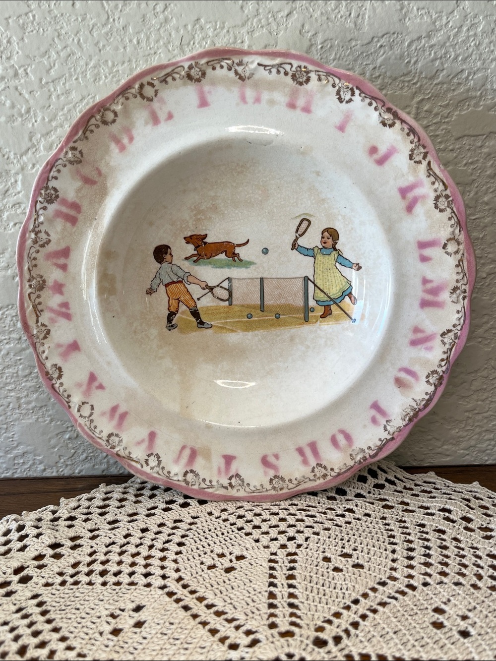 Antique D.E. McNicol Pottery 7” Child’s Plate – Children Playing Tennis Dog